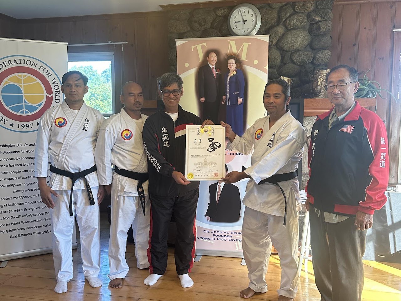 Dan certificate presentation with masters and instructors