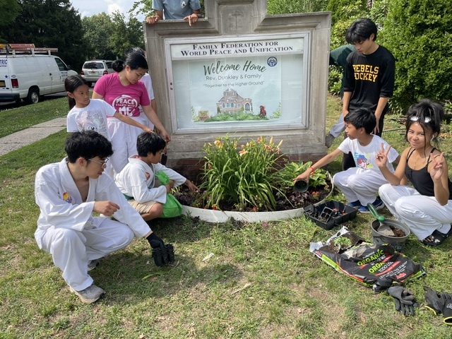 The Finished Flower Bed — The completed service project in front of the Clifton Family Church.