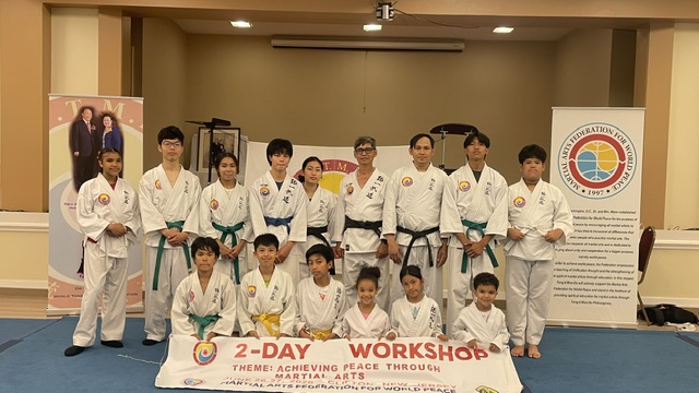 Day One Lineup — The twelve participants, ages 6 to 20 — white, yellow, green, and blue belts — w